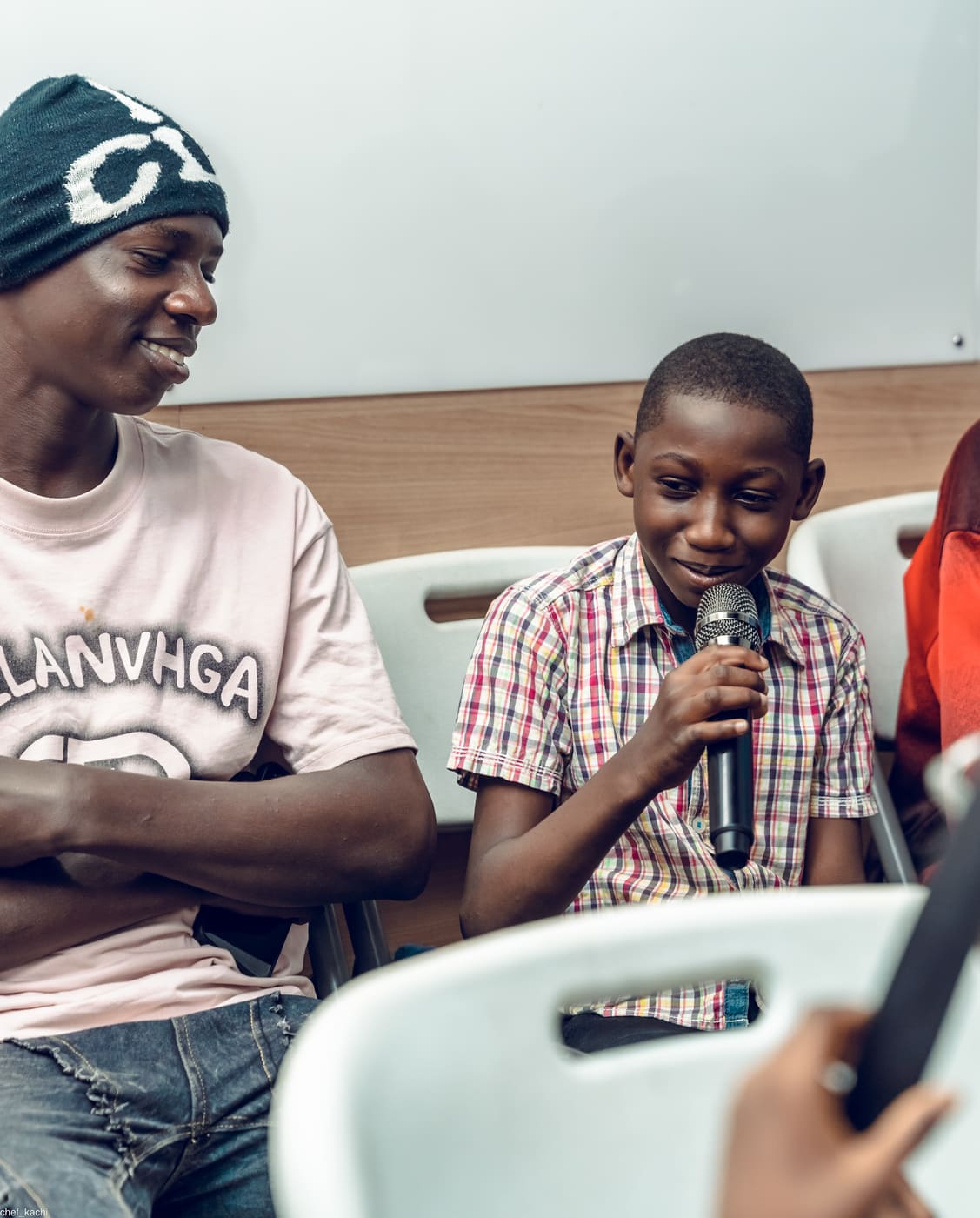A young student presenting at demo day